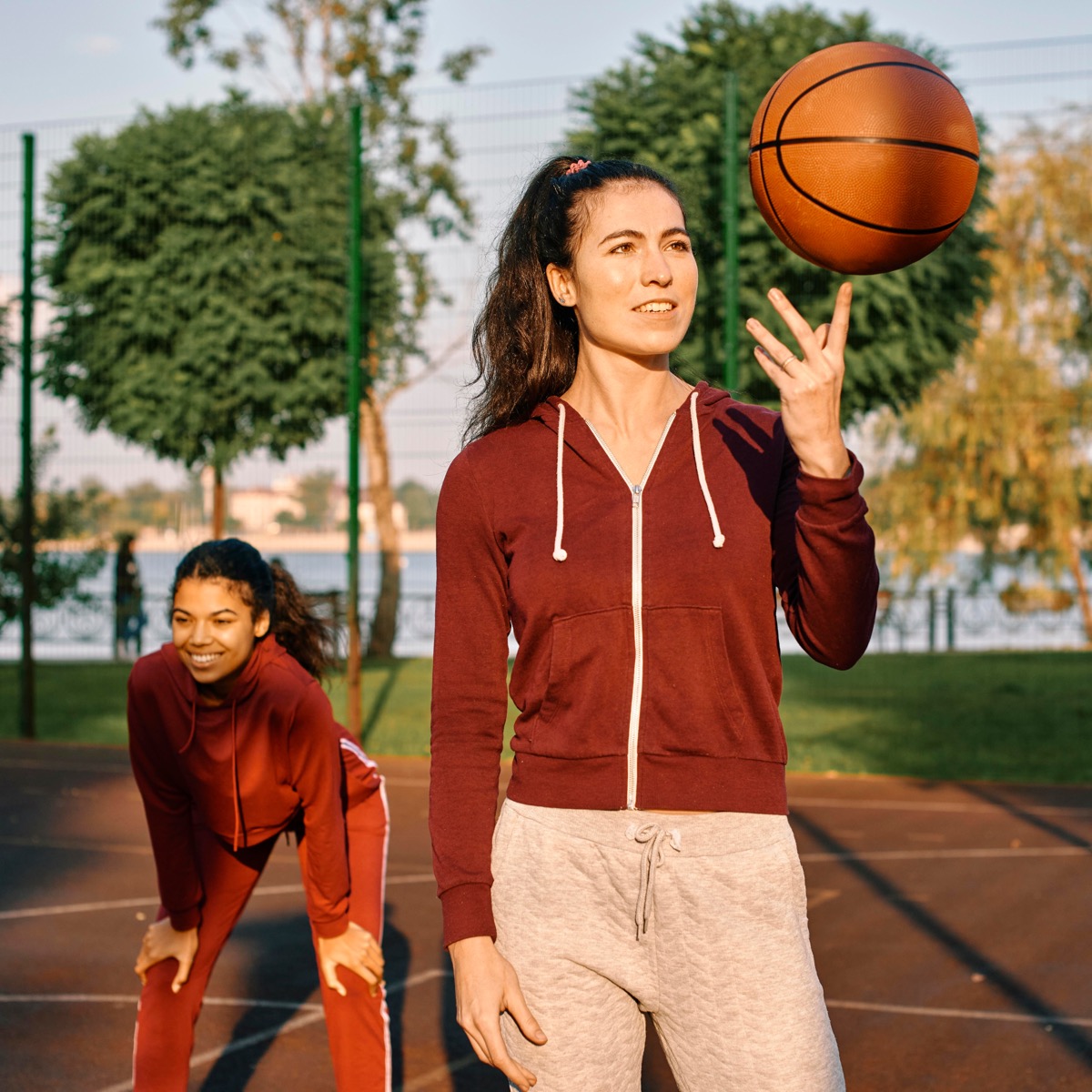 Teen playing basketball
